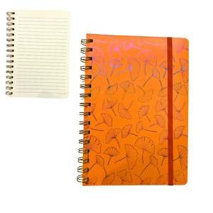 Un Cahier A5 en Spirale avec Lignes .motif Orange Fluo - Image 1 of 1