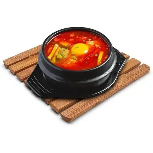 Un Dessous De Plat En Bois Utilisé Pour Poser Les Casseroles Chaudes Afin De Protéger Les Surfaces De La Chaleur.5 - Image 1 of 4