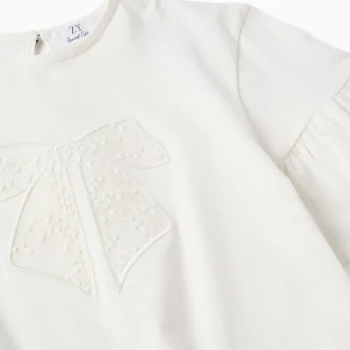 T-shirt with ruffles and embroidered bow for girls