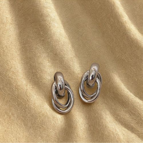Boucle d'oreille - double Twist