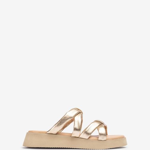 Mules Avec Des Brides Rembourrées En Cuir Doré